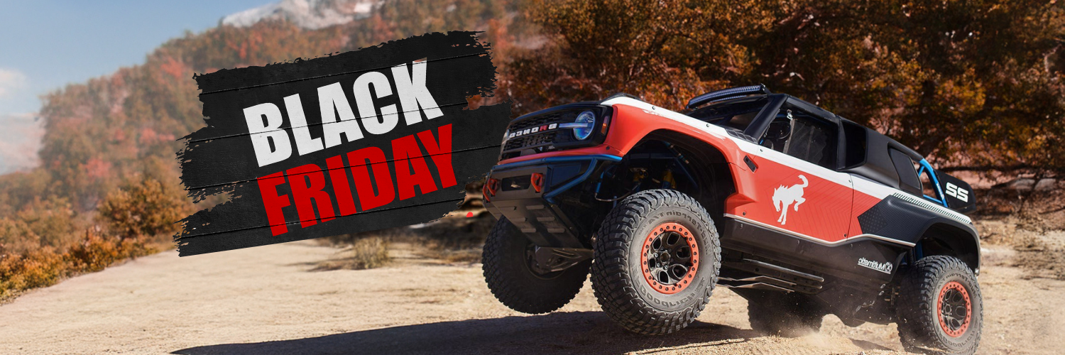 Off-road vehicle on a trail with a Black Friday banner